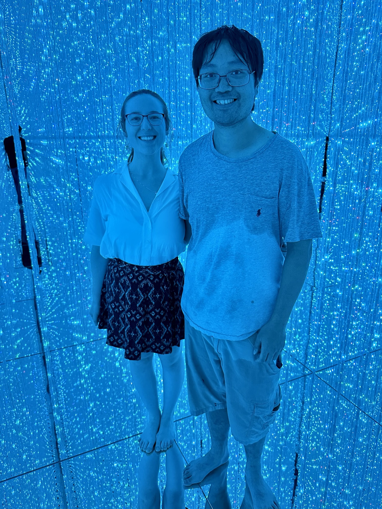 Mari-Alina Timoshchuk at the Infinite Light exhibition in teamLabs Planets in Tokyo with Cassidy Sung