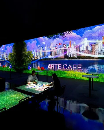 AN INTERACTIVE MEDIA ART CAFE EXPERIENCE.