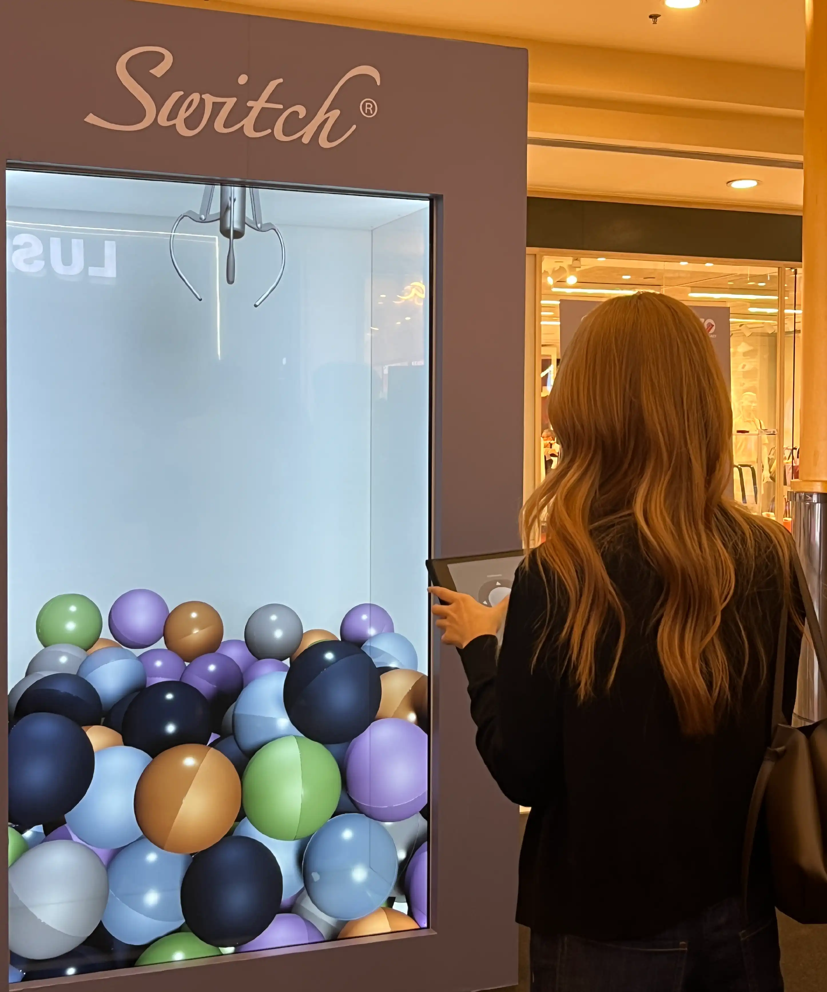 Switch to iPhone digital claw machine activation Sunway Pyramid Malaysia IMX Engine interactive gaming technology