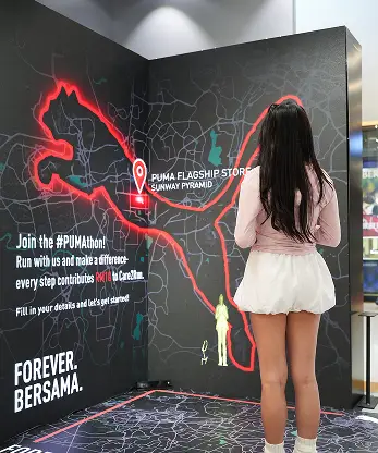 Puma flagship motion tracking interface iPad registration Malaysia store launch