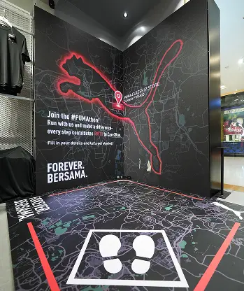 Puma Kinect running game L-shaped LED display 3D cityscape Malaysia