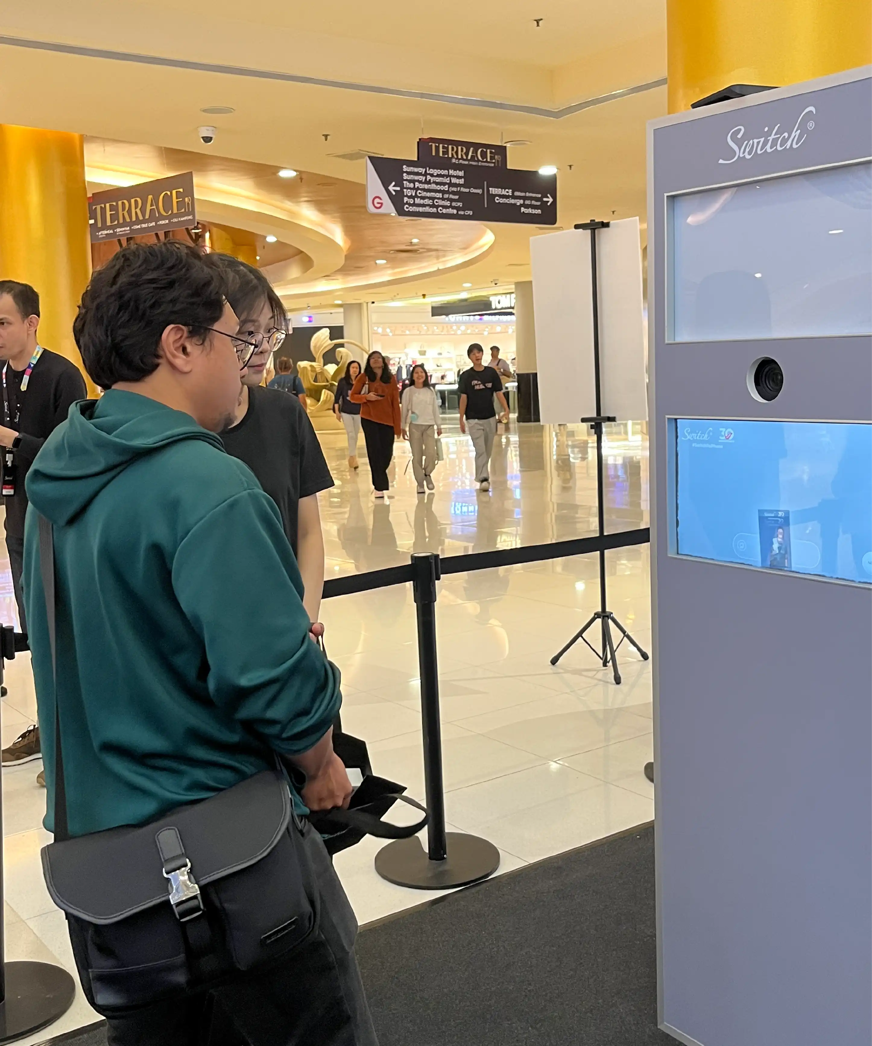 Switch iPhone 17 dual technology AI photobooth QR instant sharing Malaysia