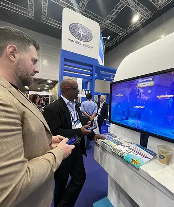 Wefic OTC Exhibition multiplayer submarine game guests playing Malaysia