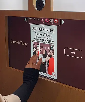 Charlotte Tilbury photo booth guests posing branded backdrop Malaysia