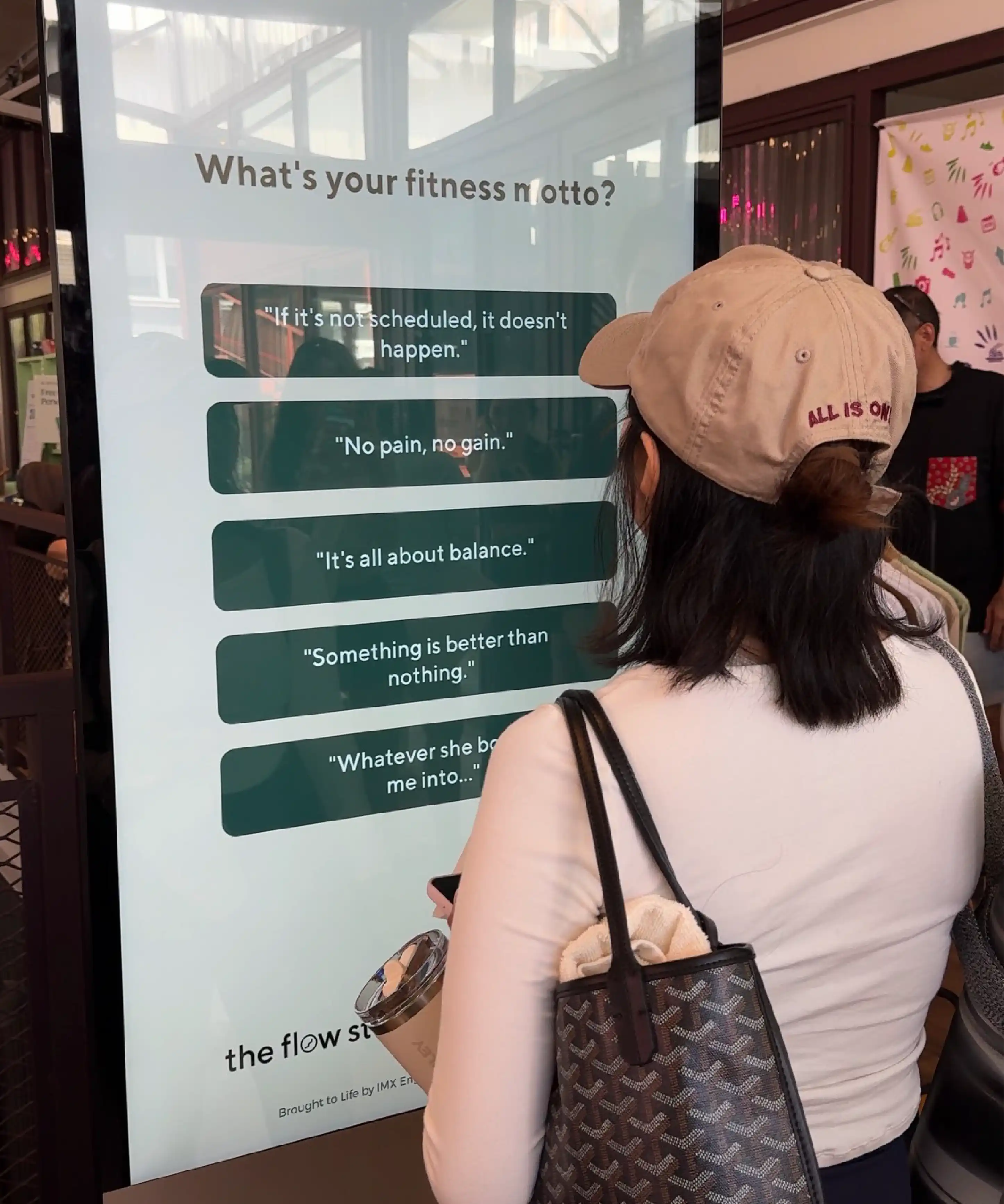 Flow Festival user interacting with quiz interface on photobooth screen