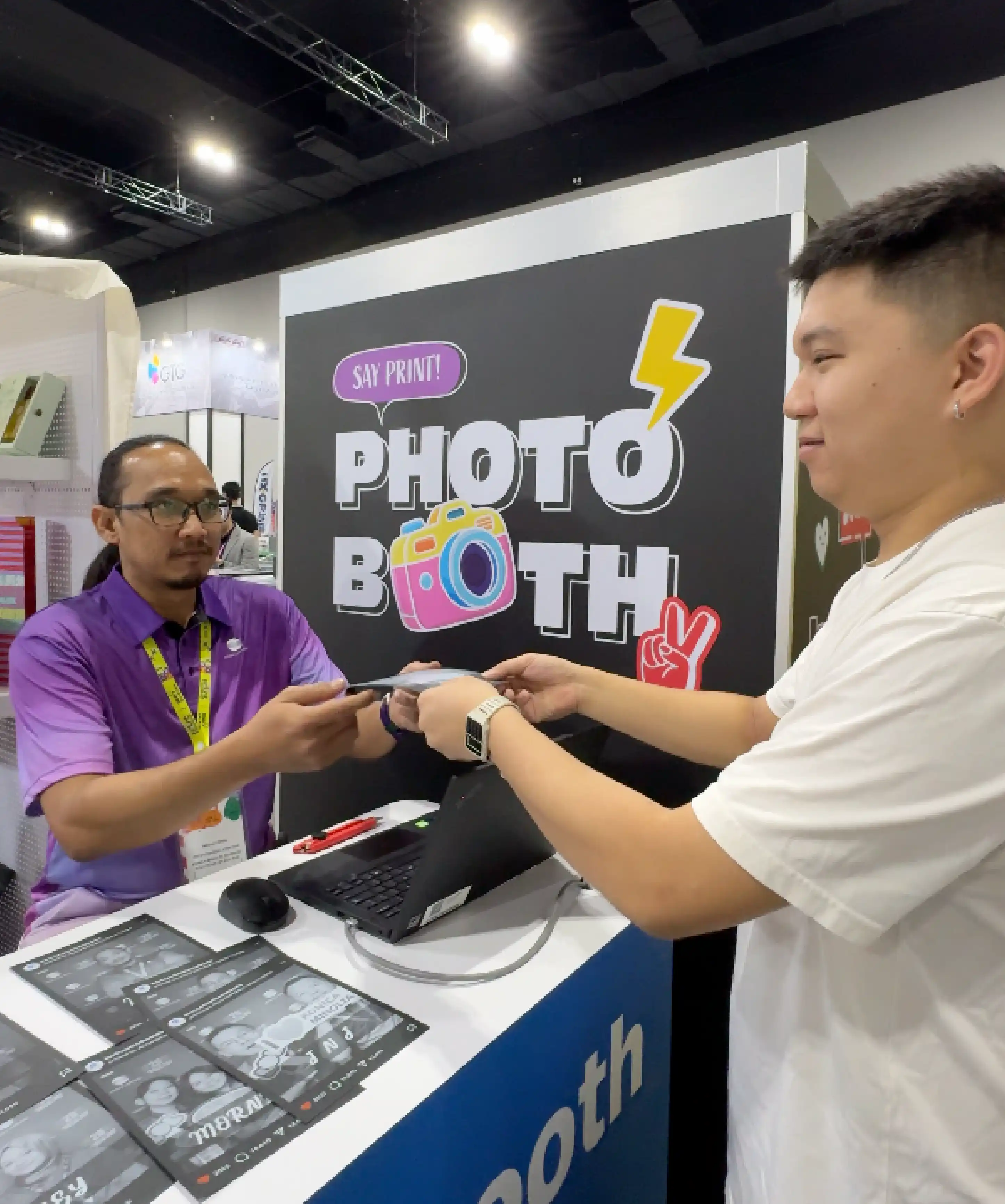 Konica Minolta white-based ink monochrome photo print on black medium showcasing printing innovation