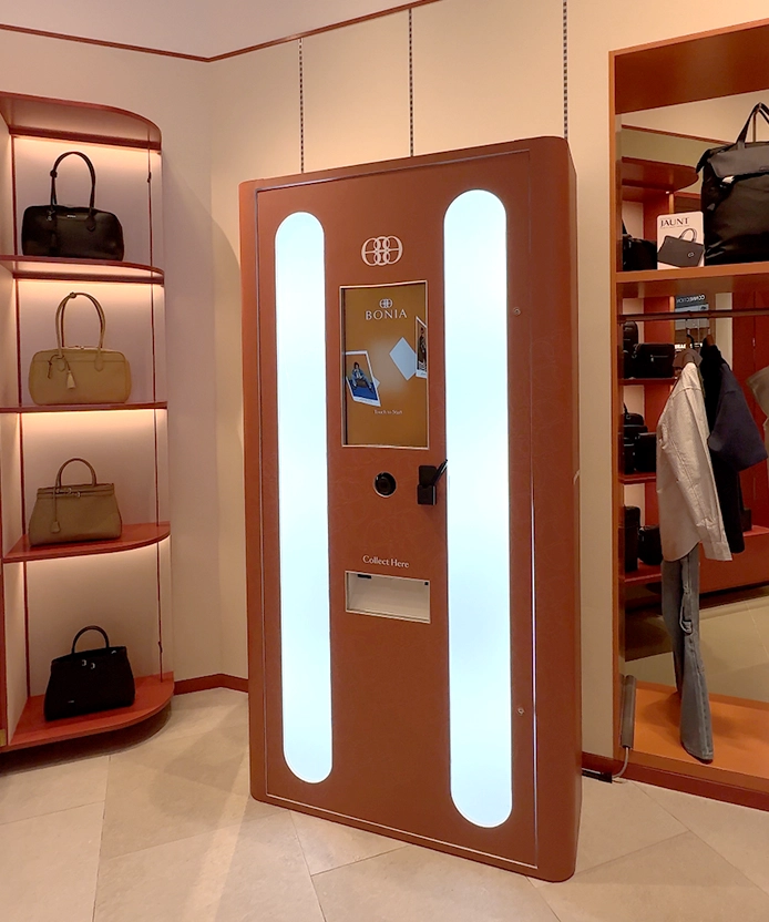 Guest posing with AI celebrity idol BONIA photobooth