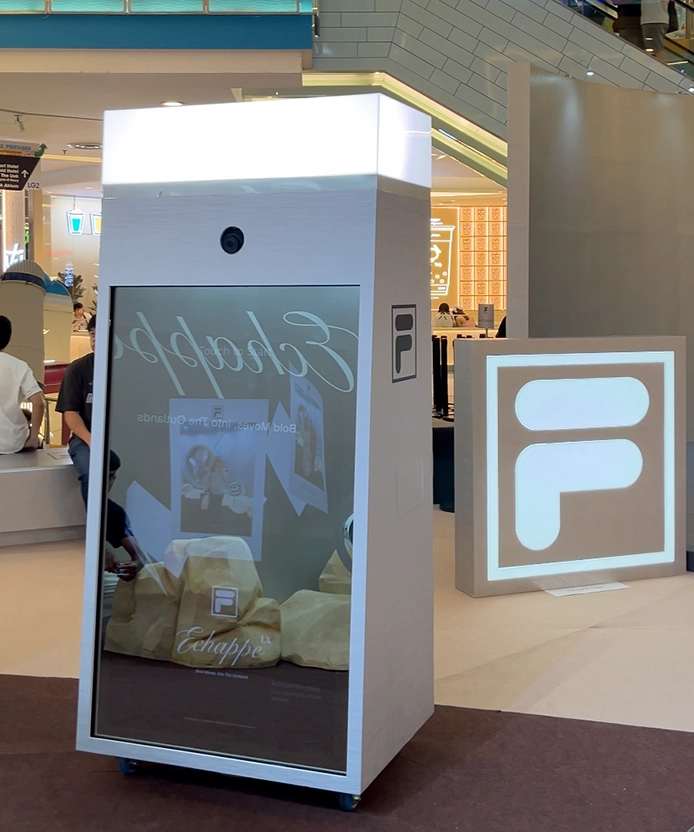 Guest interacting with FILA object-tracking mirror booth