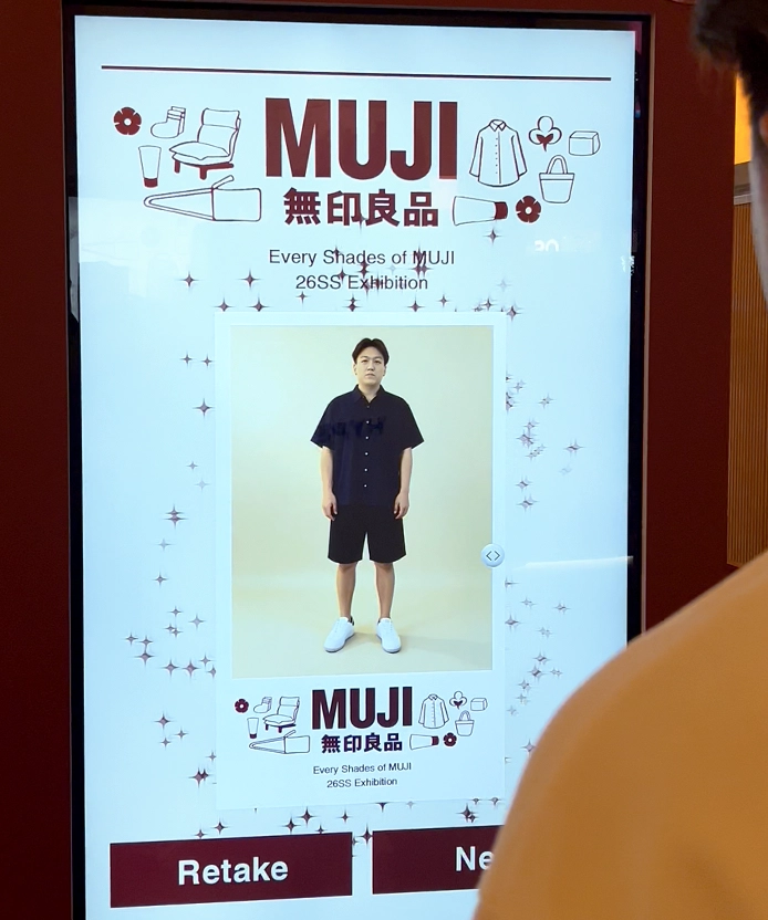 MUJI kiosk displaying a generated virtual try-on outfit preview.