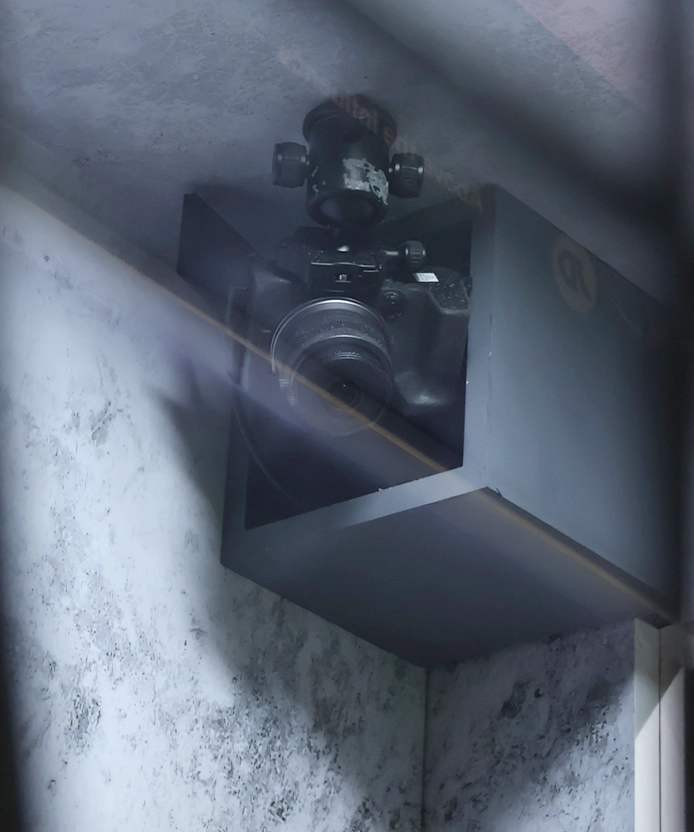 Close-up of the DSLR camera mounted inside the JD Nike photo booth.