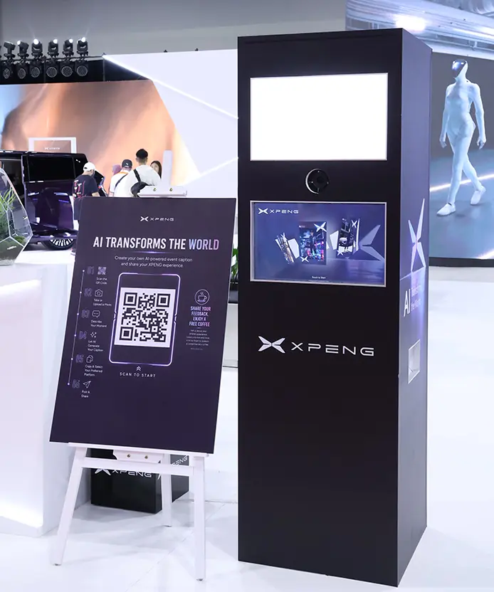 XPENG Instabox AI photo booth kiosk with scan-to-start QR standee at KL International Mobility Show 2026, Malaysia
