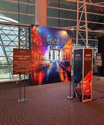 MGAN 2025 'Viva La Cuba' step-and-repeat backdrop with the Glassy Video Booth signage, Maybank Group Awards Night