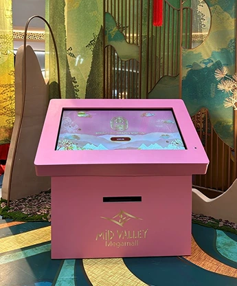 Mid Valley digital calligraphy guest scanning QR code for app membership, Kuala Lumpur