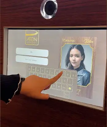 Guest entering name and phone number on AEON Credit AI photo booth touchscreen registration interface Malaysia