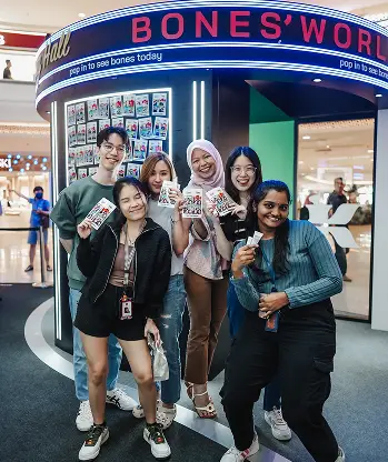 Kiehl's Bones' World Roadshow AI photo booth group photo with custom branded backdrop Malaysia