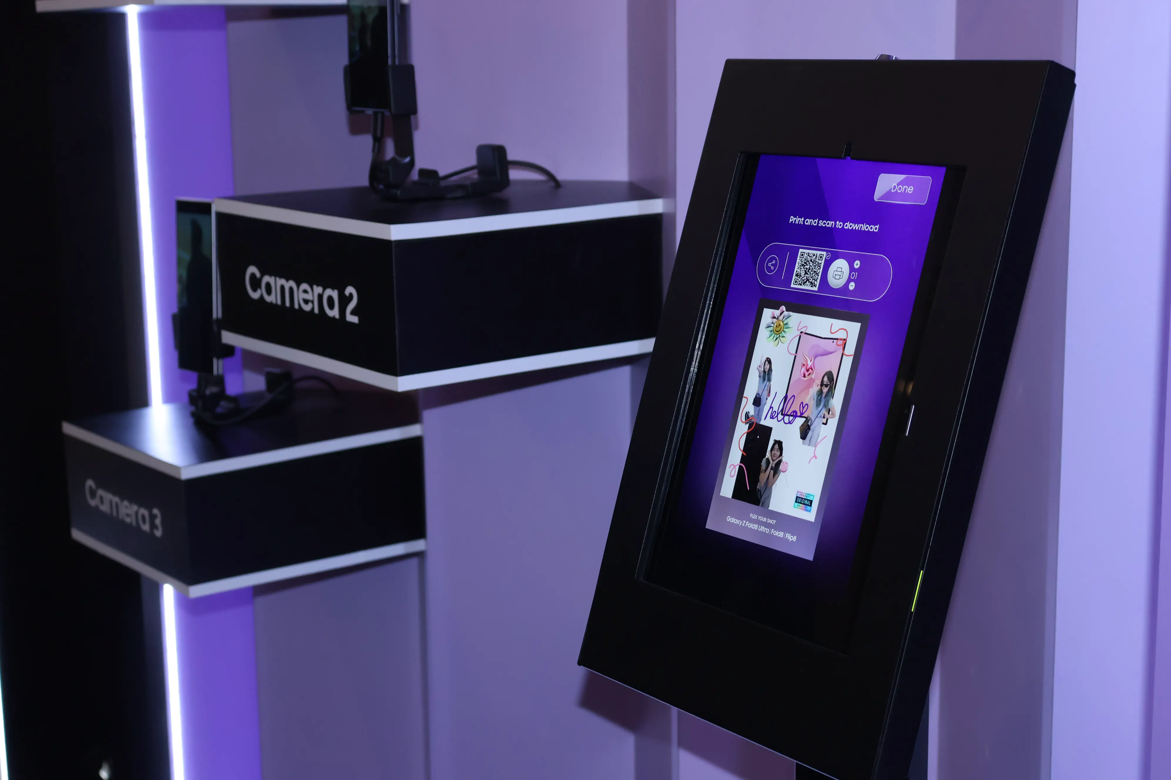 Kiosk tablet showing the print and scan-to-download QR screen