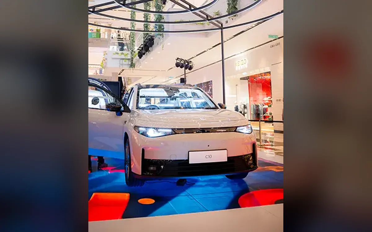 Leapmotor C10 on an LED floor inside the custom top-down photo booth