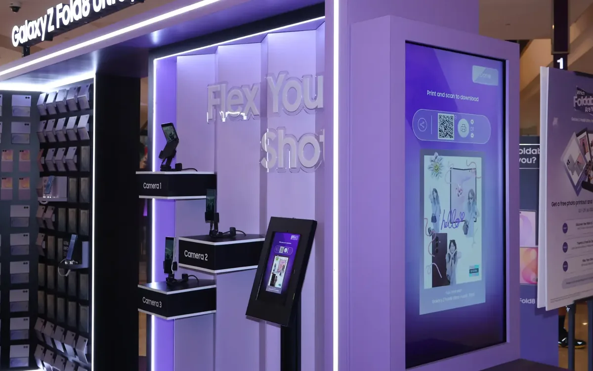 Samsung Galaxy Z pop-up booth with three foldable phone camera stations and a download kiosk