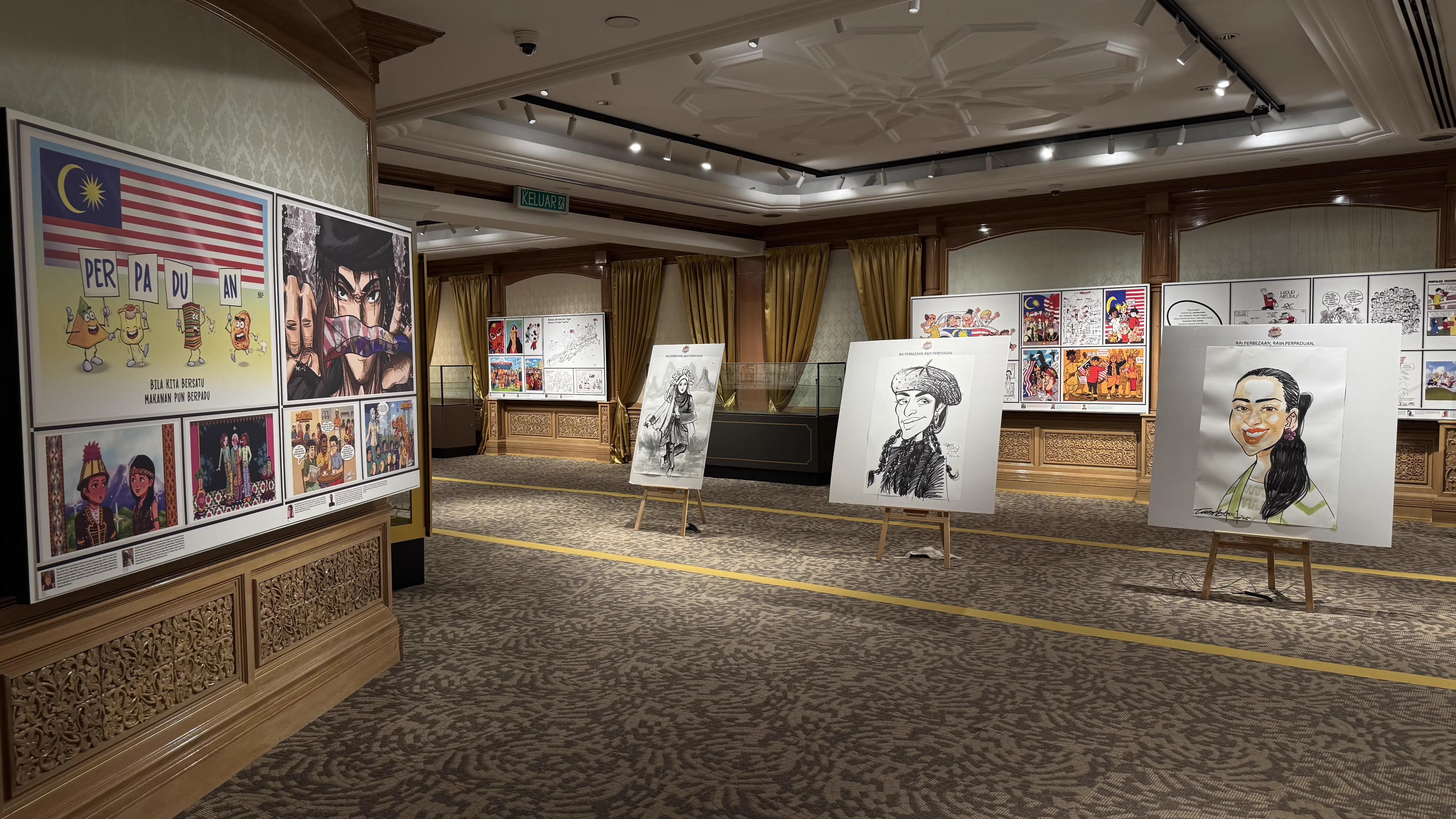 Gallery hall displaying cartoon and caricature artworks on unity themes on boards and easels