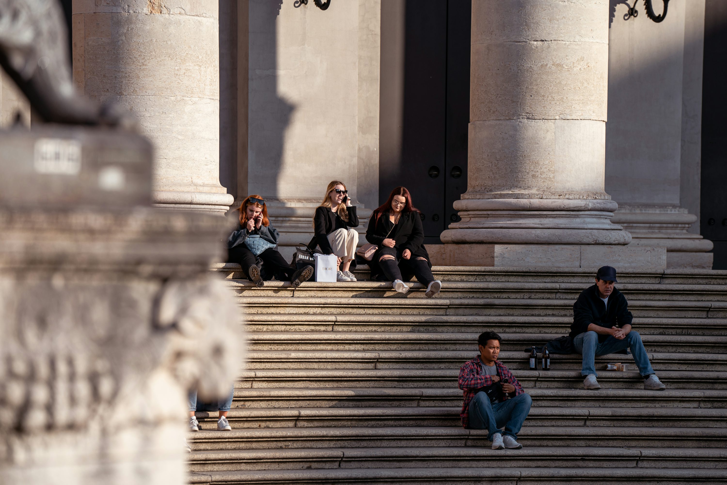people sitting on steps