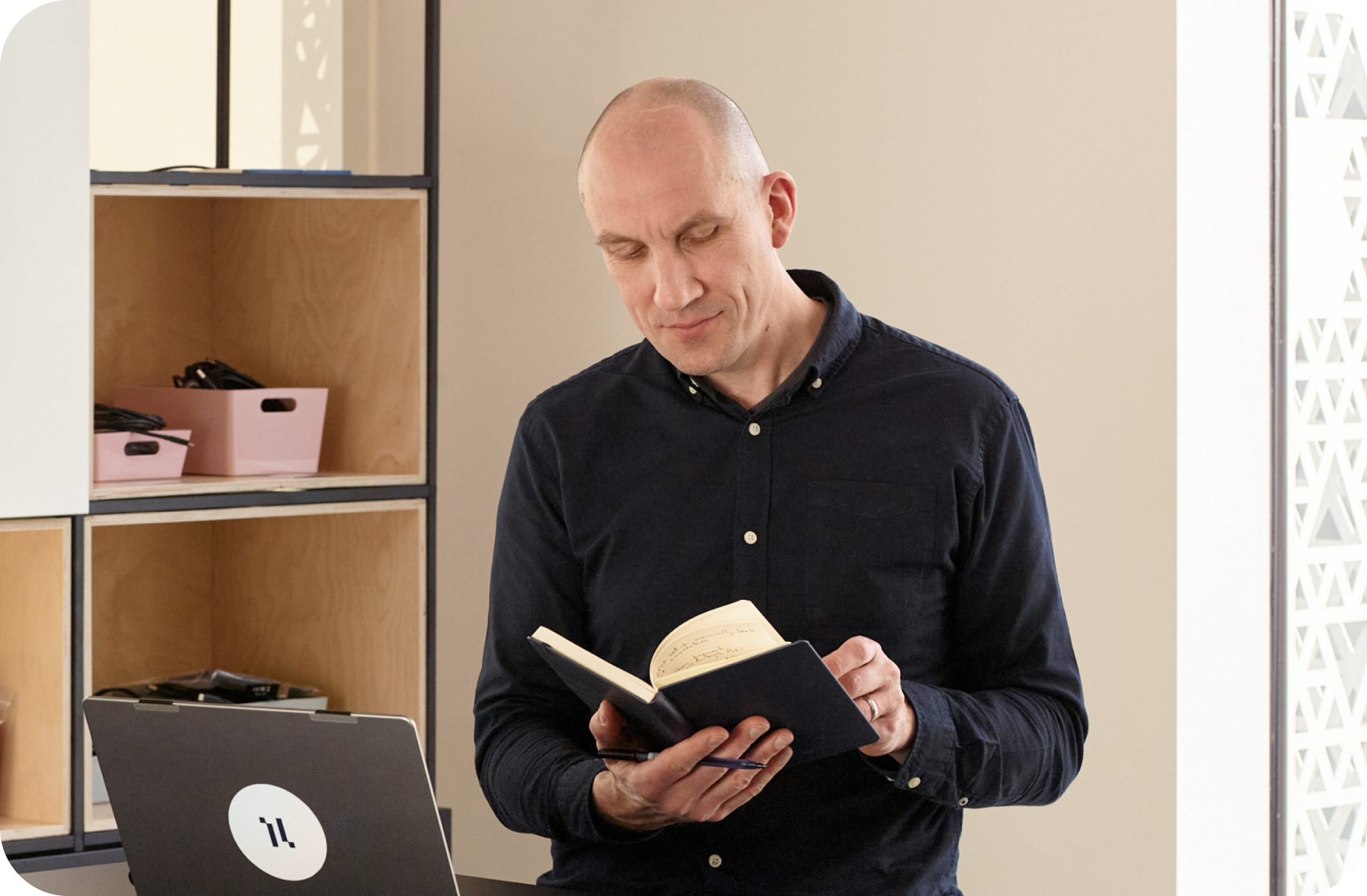 Man going through a notebook