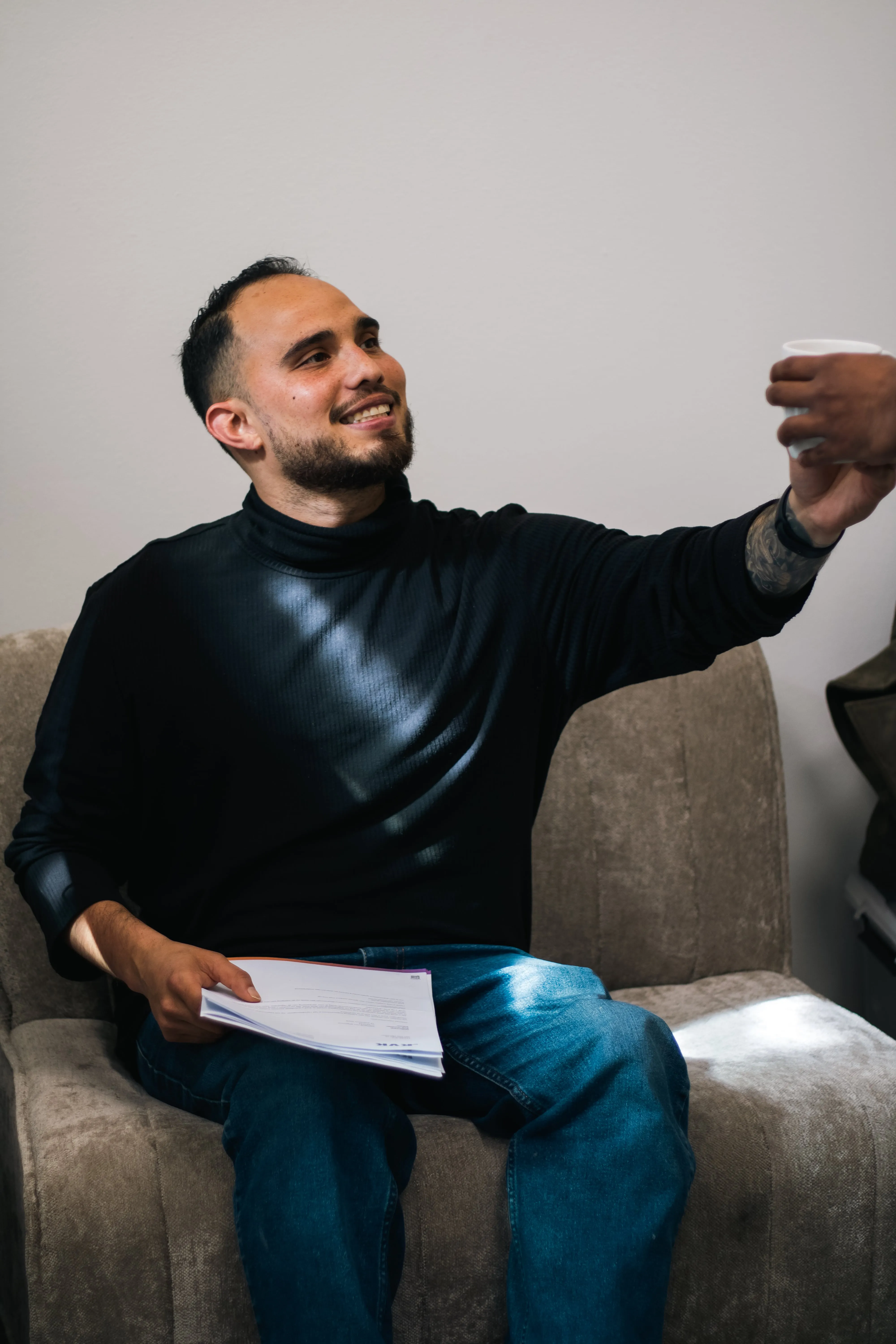 Employee sitting on a sofa