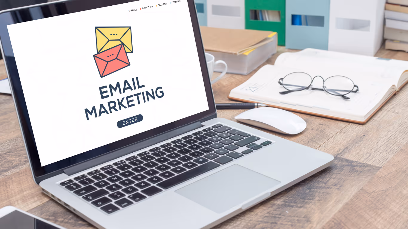 laptop showing "email marketing" heading with icon