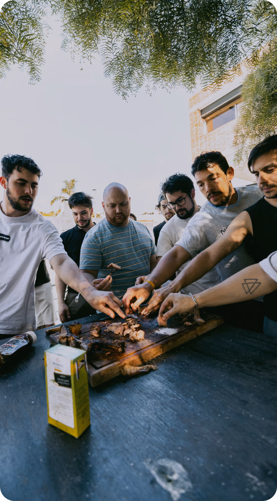 The Kaizen Softworks team bonding over a traditional Uruguayan asado (barbecue). This image reflects our spirit of camaraderie and the close-knit, collaborative culture we foster.