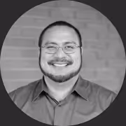 Professional headshot of Marcos Elugardo, VP of Engineering at Blueport