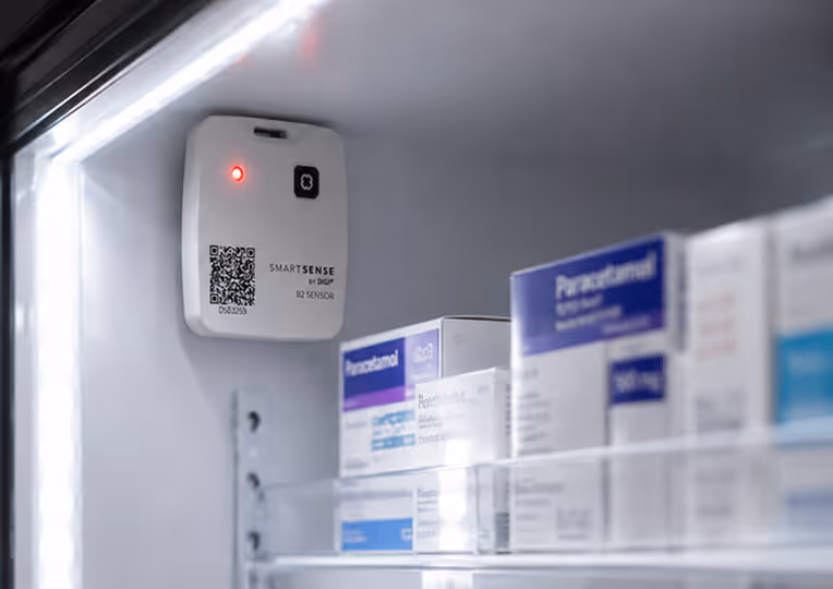 SmartSense IoT sensor installed in a pharmaceutical storage unit where incorrect setup could trigger false alarms.