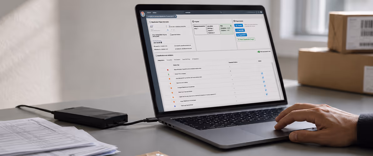 Laptop showing a customs compliance platform used to automate data validation for bulk e-commerce imports.
