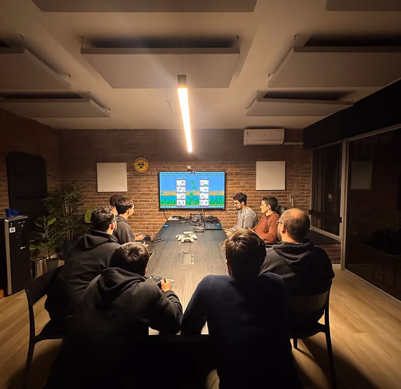 Team members playing games at a Kaizen gaming night.
