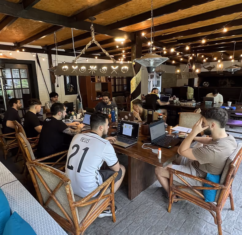The team at the annual beach house getaway.