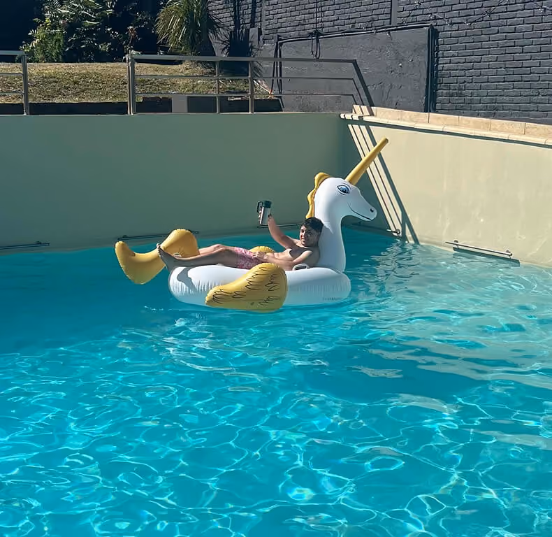 Team members enjoying a summer pool break.