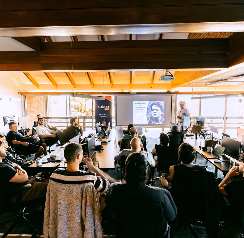 Kaizen team gathered in the office for an internal Kaizen Talk.
