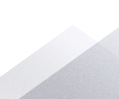 Abstract geometric pattern of overlapping translucent triangles in shades of gray.