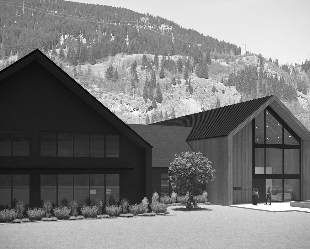 Modern wooden house with a gable roof and large windows in a mountain setting
