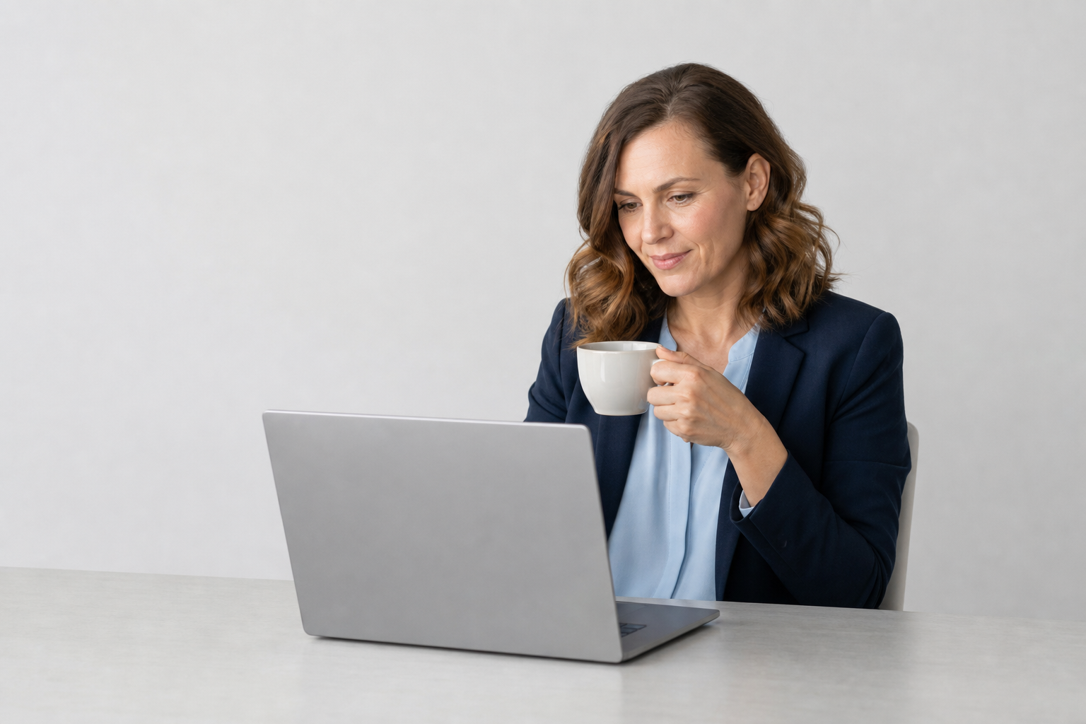 A manager reading the 360 briefing Atlas prepared for her team