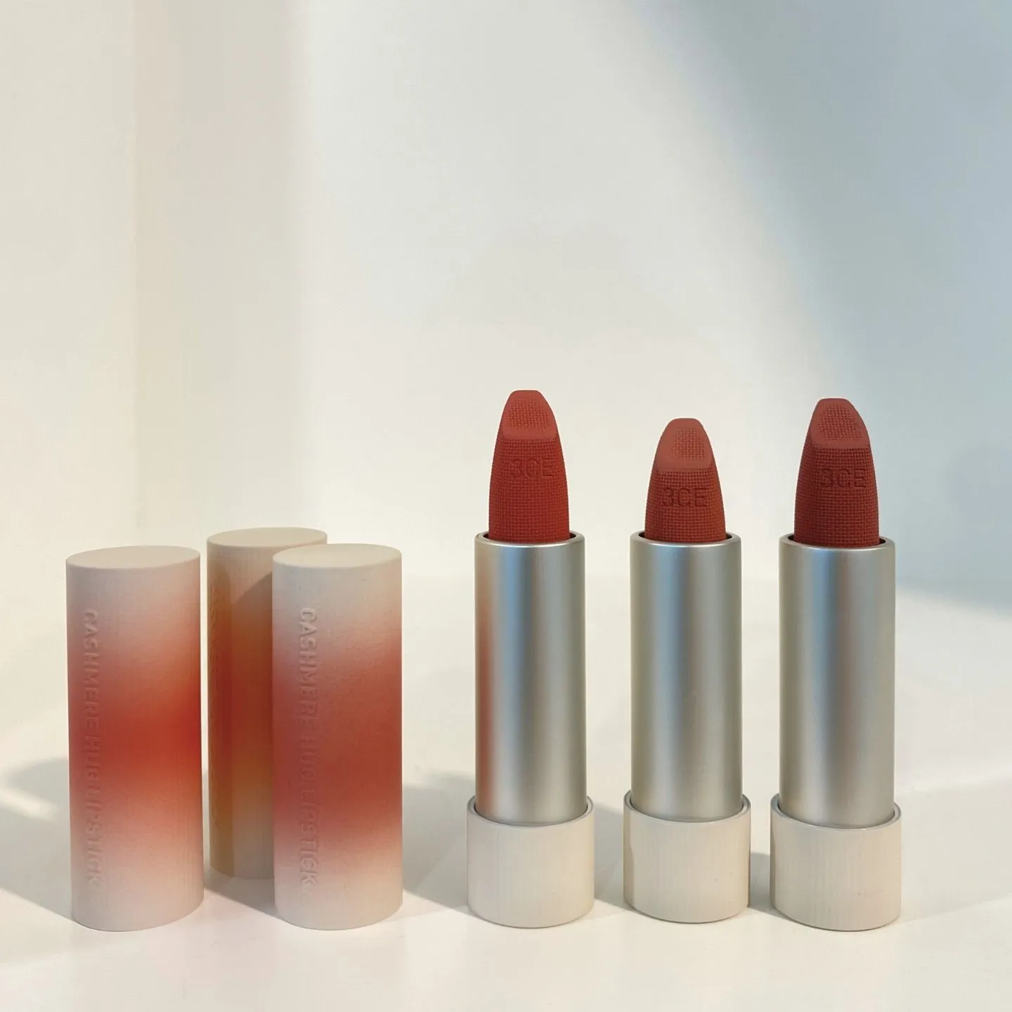3CE 캐시미어 허그 립스틱 01 OAT, 06 BUDDY, 09 TAUPE BEIGE 제품 이미지 (3CE Cashmere Hug Lipstick OAT, BUDDY, TAUPE BEIGE product image)