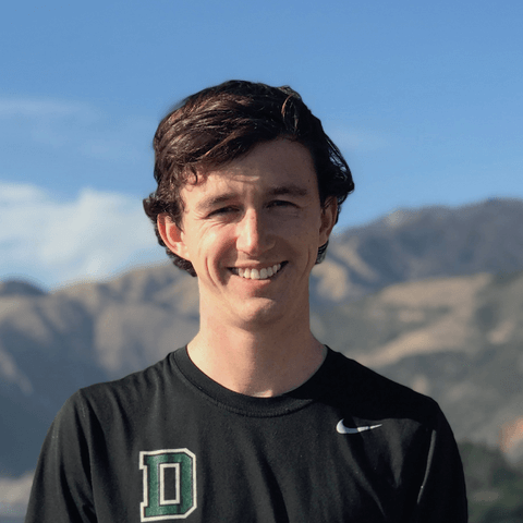 a man smiling for a picture