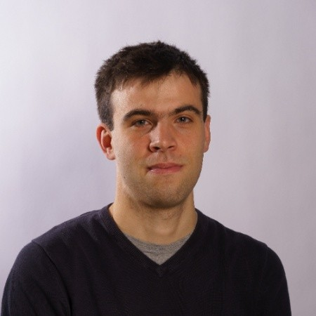 a man in a black sweater