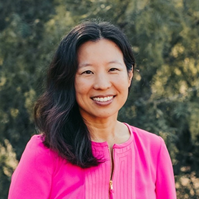 a woman in a pink shirt