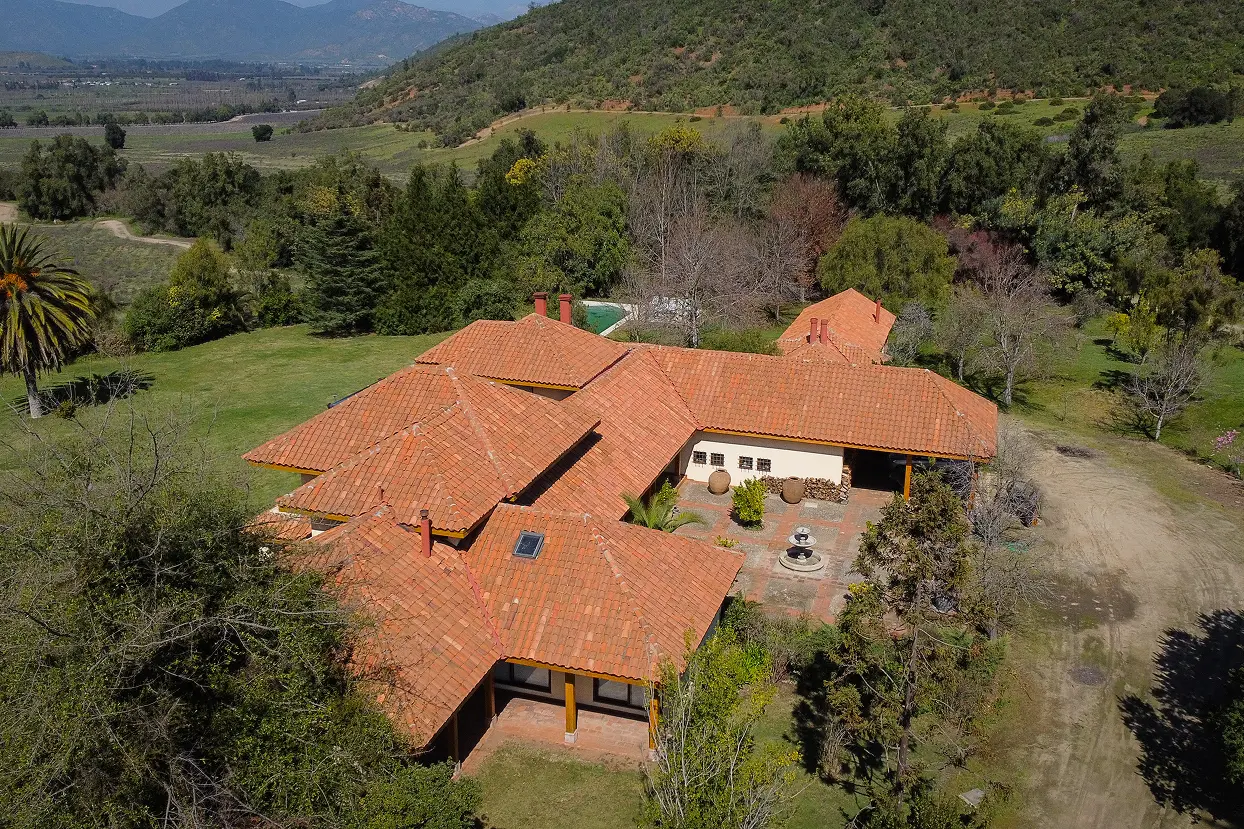 Aerial drone view of The Vineyard House and Casablanca Valley vineyards, private wine country stay Chile