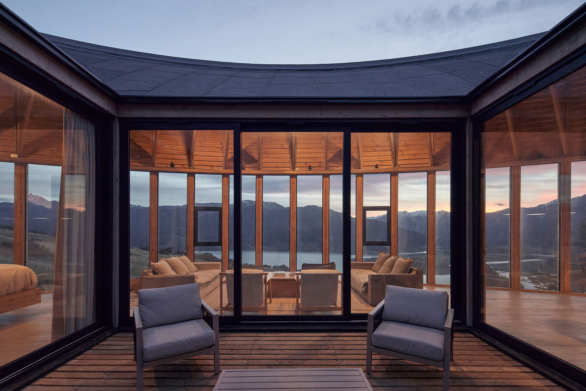 Freestanding bathtub with lake and mountain views at Bahia Murta House, Carretera Austral