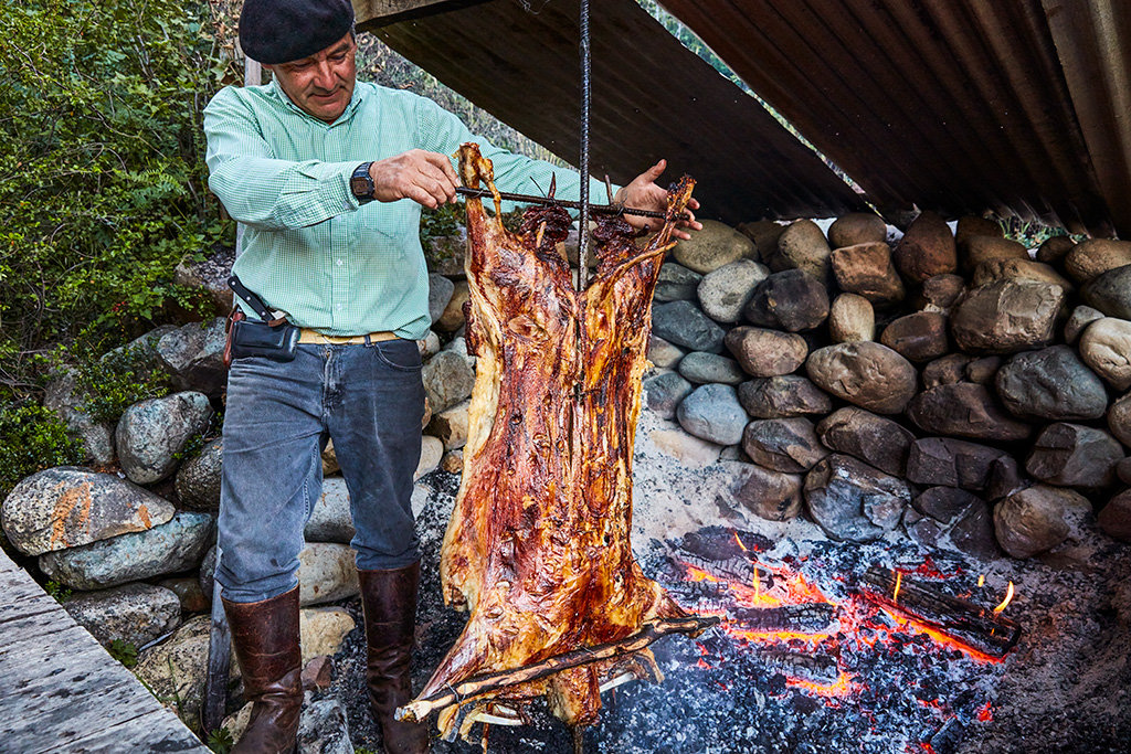 Traditional Patagonian lamb asado, cordero al palo, in Aysén