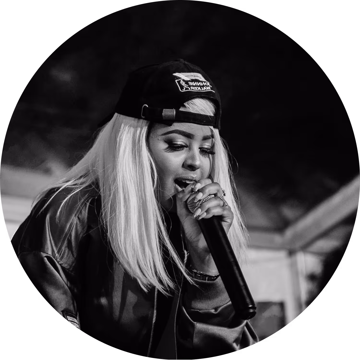 Music artist performing on stage.