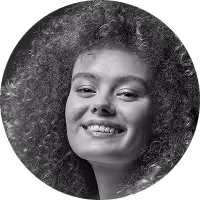 A smiling 20-something female.