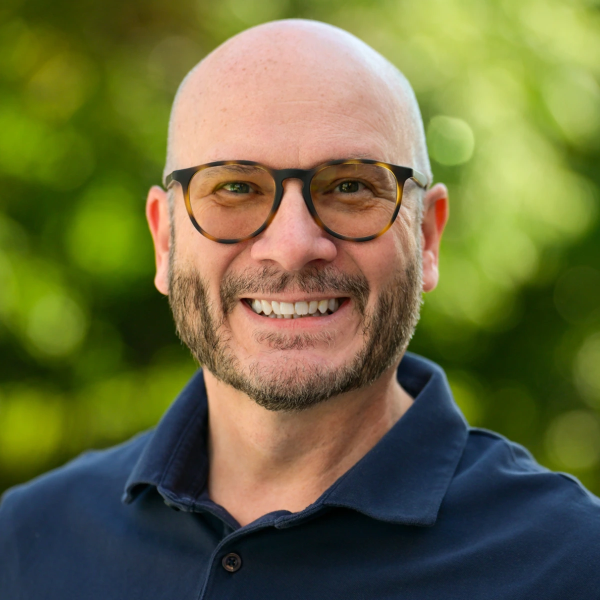 A headshot of the team member.