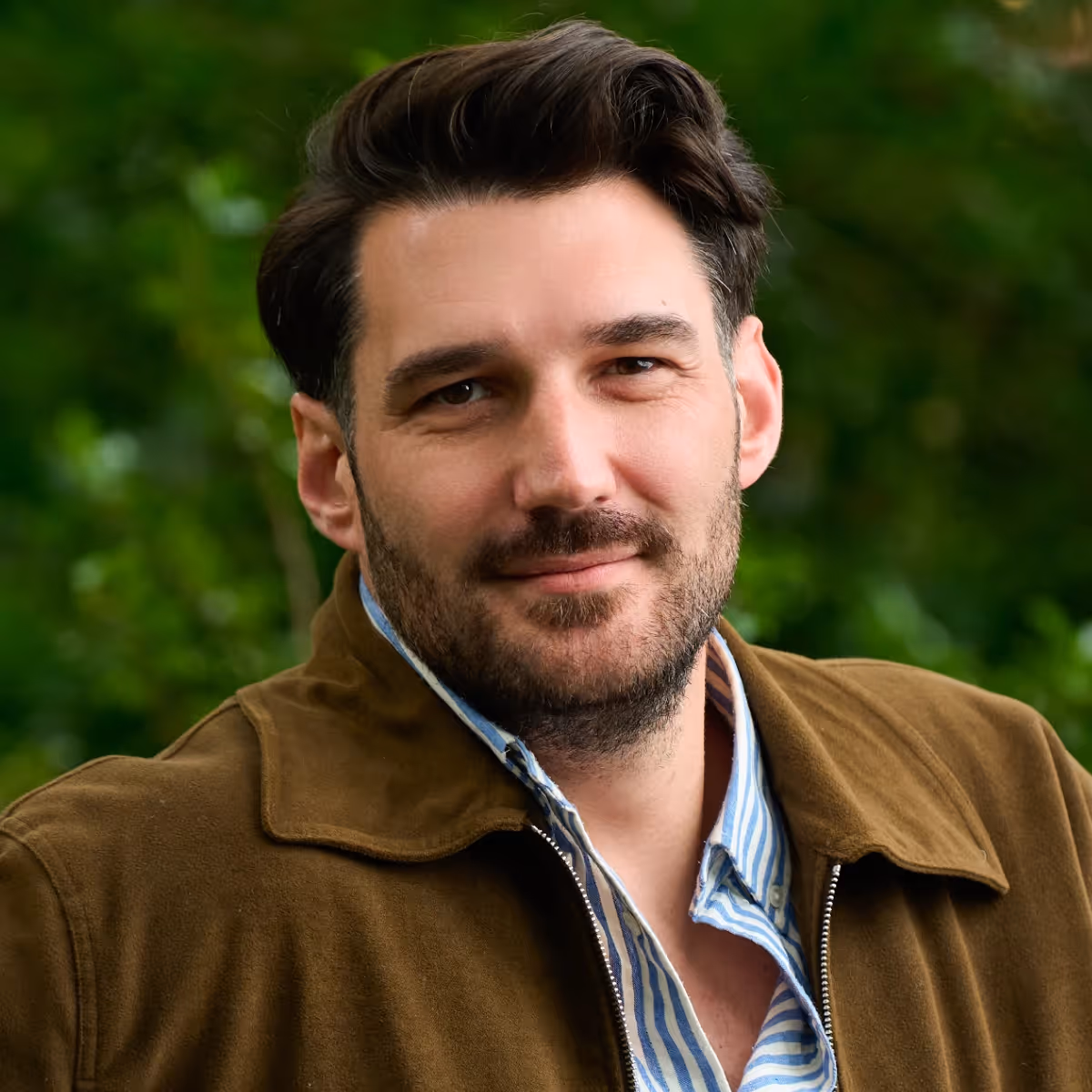 A headshot of the team member.