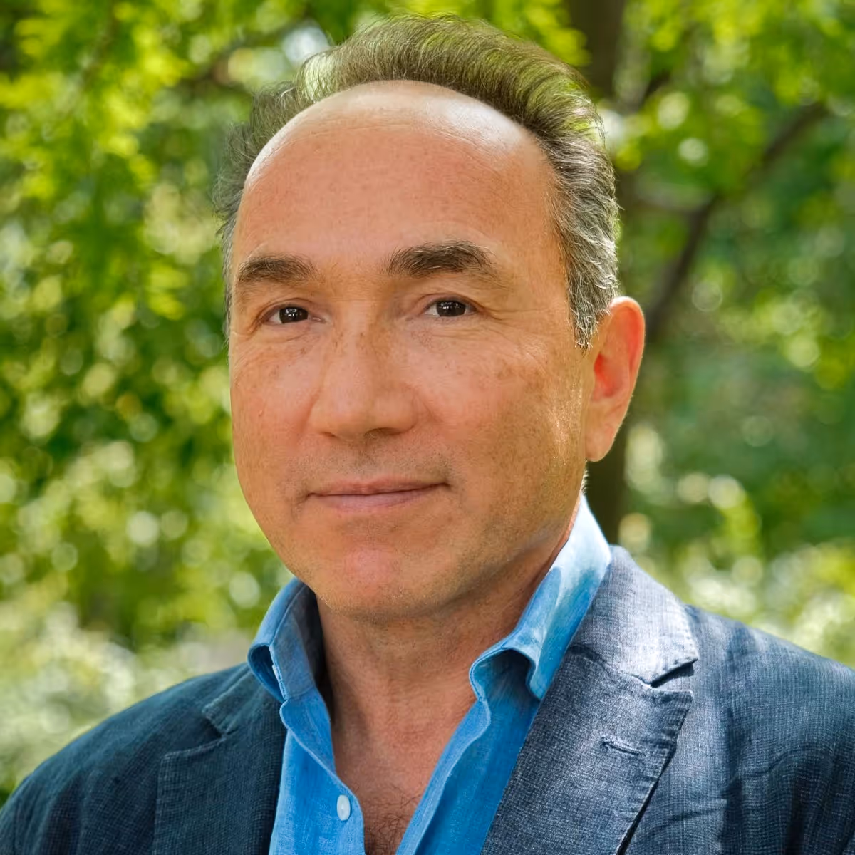 A headshot of the team member.